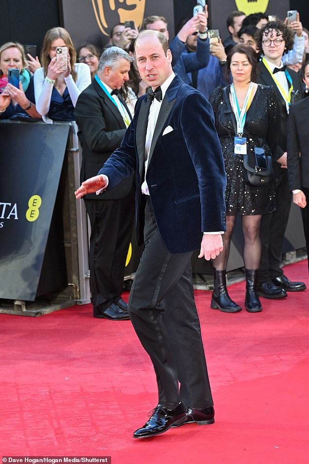 Sharp! The Prince, dressed in a suit and boots, cut an elegant figure as he arrived at the awards ceremony.