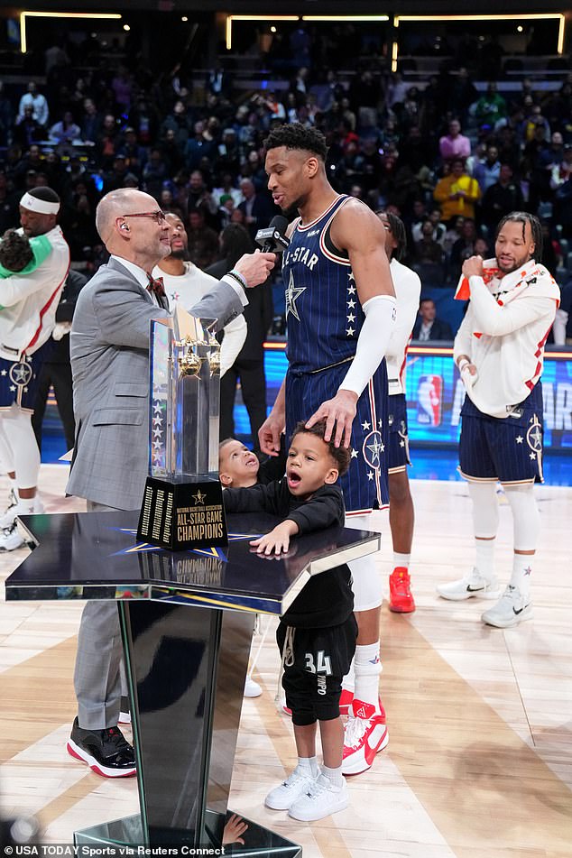 Antetokounmpo is seen with his children after the East beat the West in the NBA All-Star Game