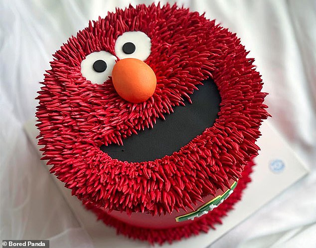 Who could not love this cheeky little guy?  That frosting technique is impressive, but it might be difficult to cut off Elmo's face.