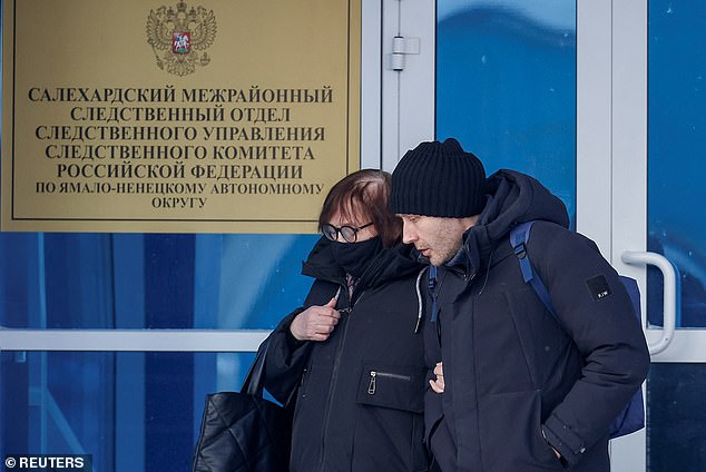 Lyudmila Navalnaya, mother of the late Russian opposition leader Alexei Navalny, and her lawyer Alexei Tsvetkov leave an office of the regional department of the Investigative Committee in the city of Salekhard.