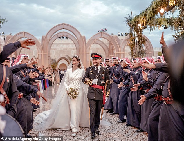 Crown Prince Hussein and Rajwa Al Seif arrive at their wedding reception at Huseyni Palace in Amman, Jordan, on June 1, 2023.