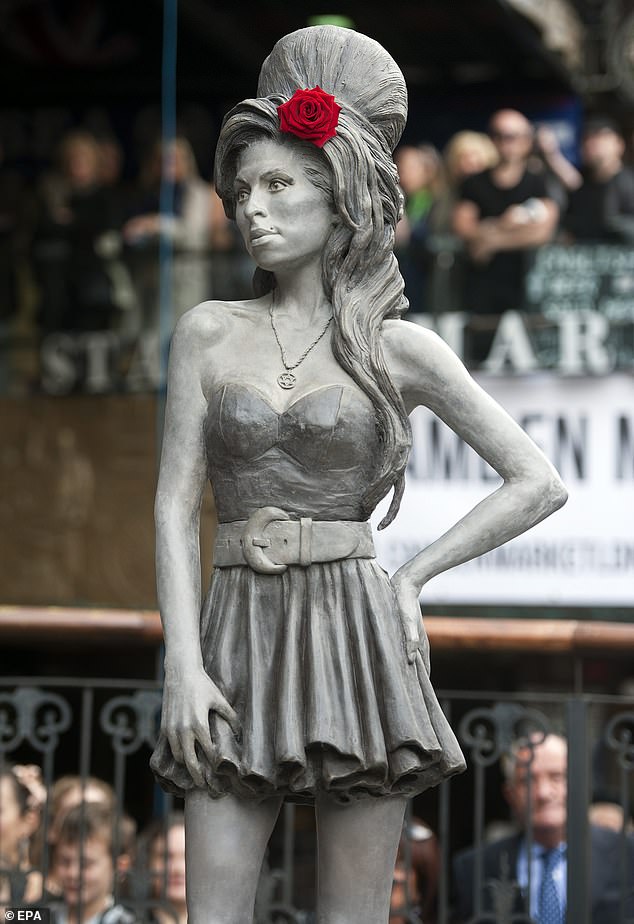 The statue was unveiled in Camden Market in 2014, measuring 5ft 9in tall and showing the late singer wearing the necklace.