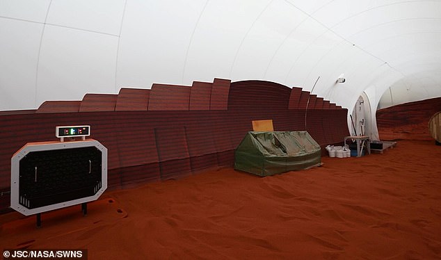 A view of the CHAPEA (Crew Health and Performance Exploration Analog) 3D-printed habitat based at NASA's Johnson Space Center in Houston, complete with Mars sand 
