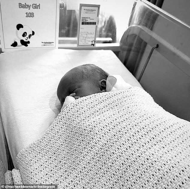 Posting an adorable photo of Rose, Rachael, 39, captioned the post: 'Rose Bess Downie-Drury 02.16.24 ❤️ Our little girl is here ❤️'