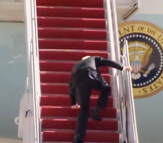 Biden has fallen several times on the steps of Air Force One, resulting in frequent use of the shorter, lower staircase over the past year. Pictured: Biden falls to his knees after slipping three times climbing the stairs to Air Force One on March 18, 2021.