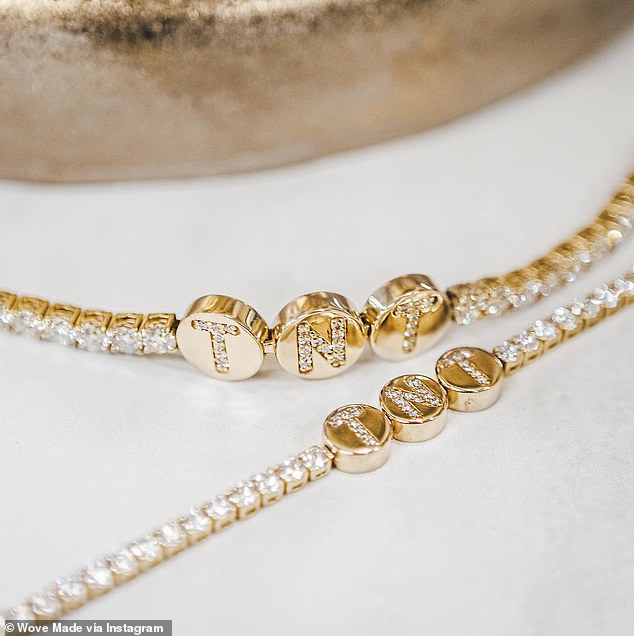 Taylor and Travis' custom-made diamond bracelet appears to include the couple's initials.