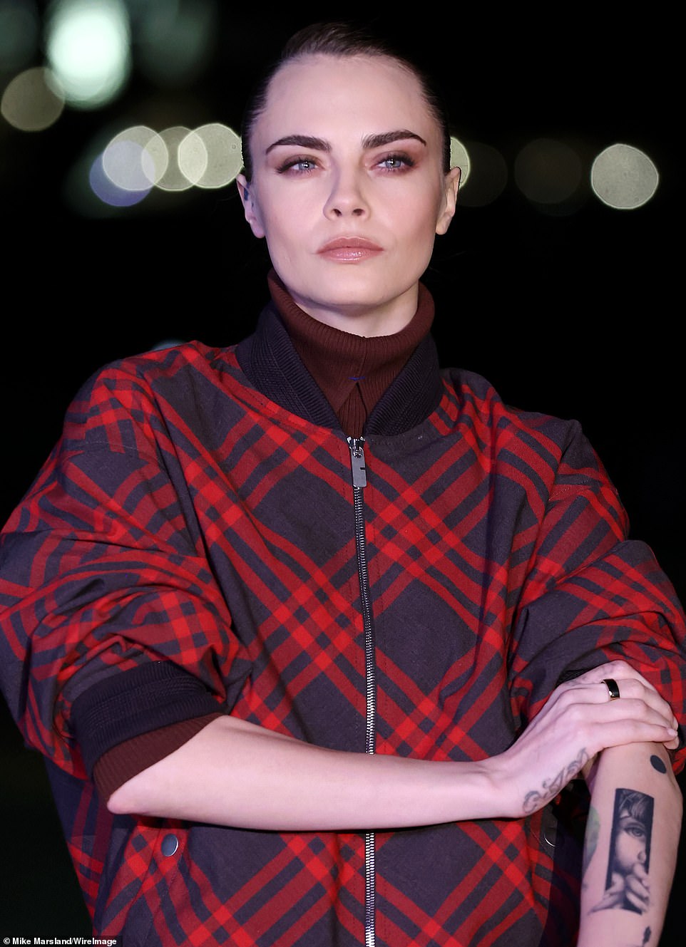 1708372270 117 Cara Delevingne commands attention in a striking plaid co ord as