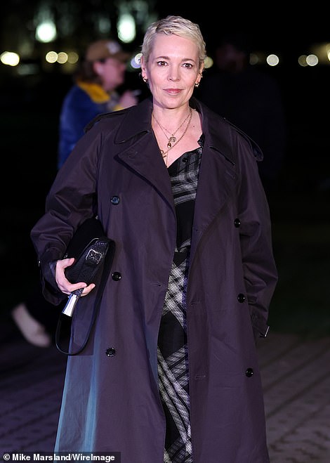 Oscar winner Olivia, 50, opted for an elegant long checkered dress which she paired with a chic trench coat.