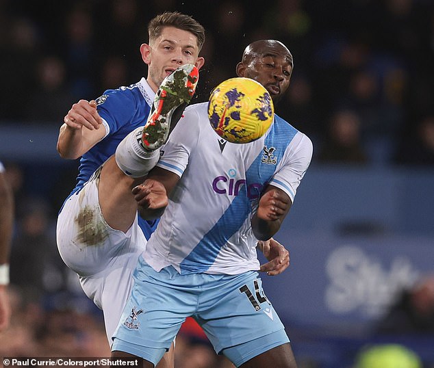 Palace striker Jean-Philippe Mateta tangles with Everton defender James Tarkowski