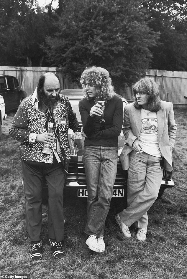 Director Peter Grant (left) with Led Zeppelin singer Robert Plant (centre) and bassist John Paul Jones at Knebworth House.
