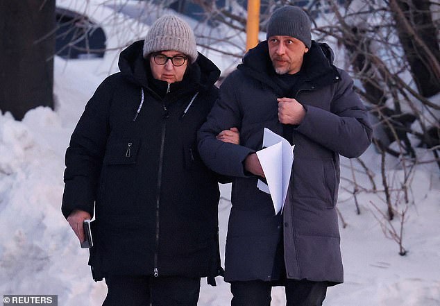 Lyudmila Navalnaya, mother of the late Russian opposition leader Alexei Navalny, and lawyer Vasily Dubkov arrive at the regional department of the Russian Investigative Committee in the town of Salekhard in the Yamal-Nenets region, Russia, February 17, 2024 .
