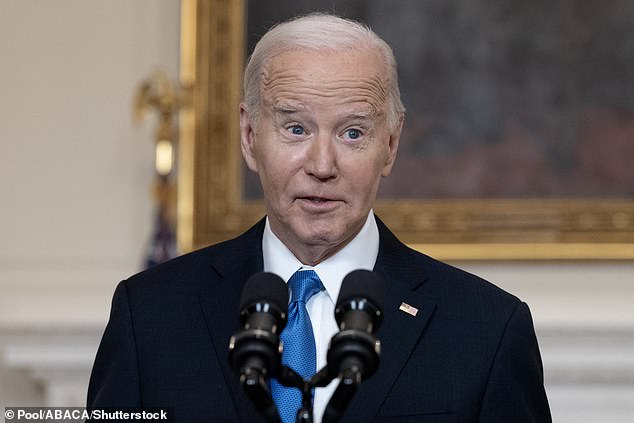 US President Joe Biden delivers a speech in the State Dining Room of the White House.