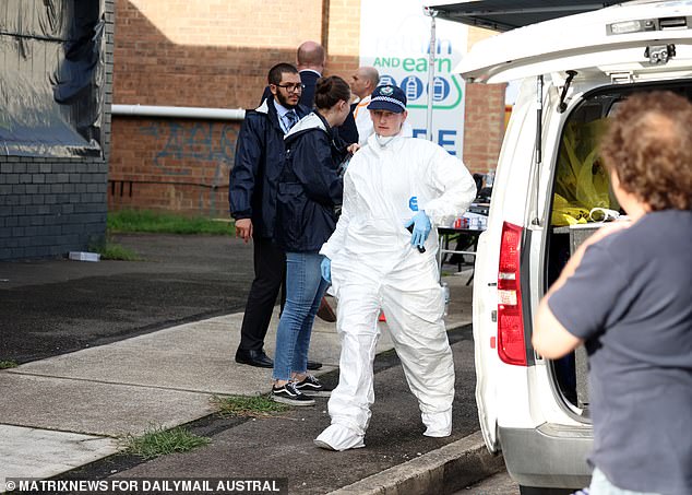 Forensic agents spent much of Tuesday examining the grim scene at the martial arts studio.