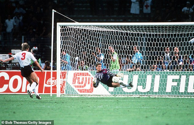 German goalkeeper Bodo Illgner saves England's Stuart Pearce in the 1990 semi-final.