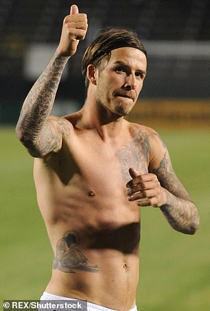 The Man of Pain tattoo is seen on David while playing with the LA Galaxy team in 2011.