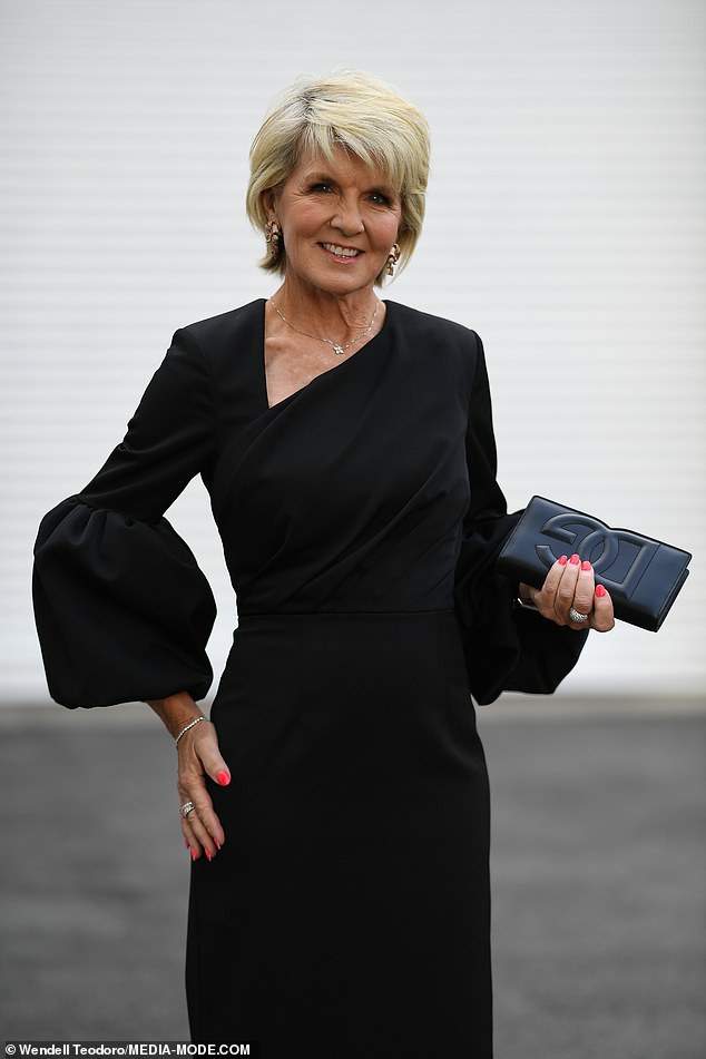 The former politician, 67, looked glamorous and elegant dressed in black from head to toe.