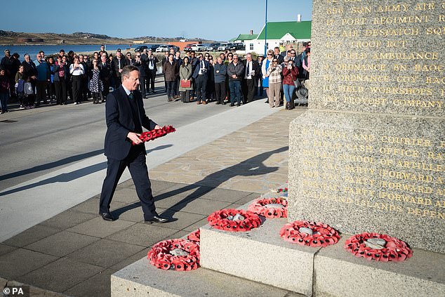 Foreign Secretary Lord David Cameron attends a wreath-laying ceremony at the Falklands conflict memorial in Port Stanley, Falkland Islands.