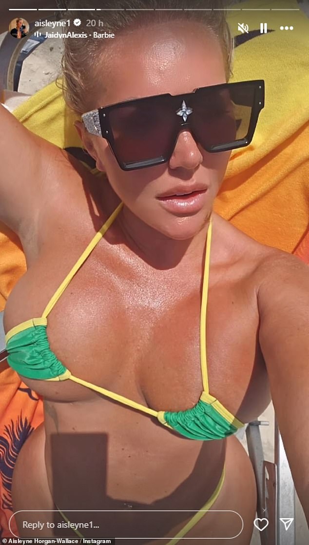 The former Big Brother star, 45, showed off her amazing figure as she donned the skimpy green and yellow two-piece.