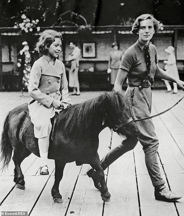 A lady-in-waiting took the then-Princess Elizabeth and her younger sister, Princess Margaret, on a visit to London Zoo's Pets Corner in 1937.