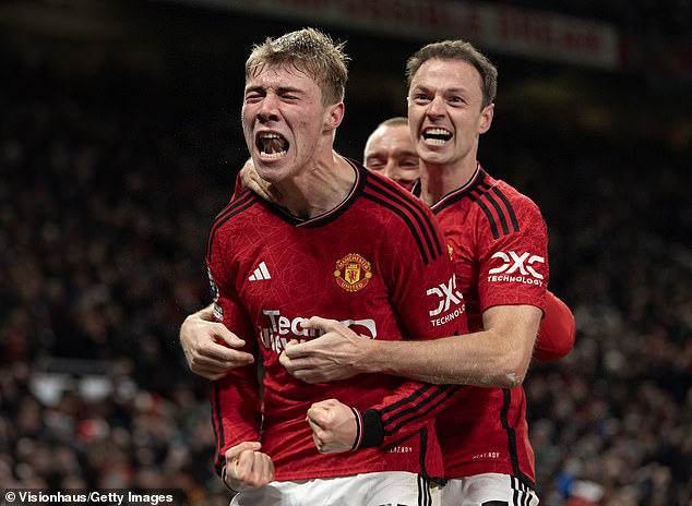 Manchester United's Rasmus Hojlund is seen celebrating a December goal with Jonny Evans