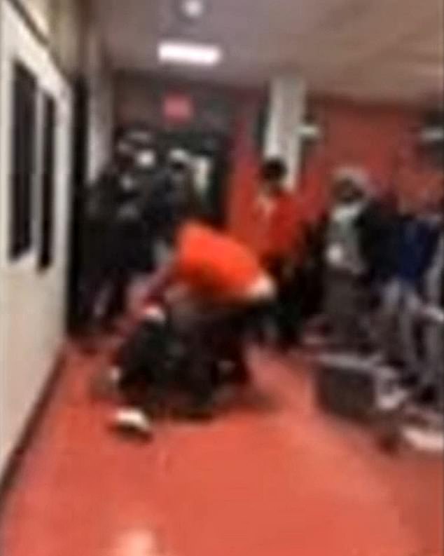 Another video seen by Boston 25 shows two individuals fighting inside what appears to be a classroom.