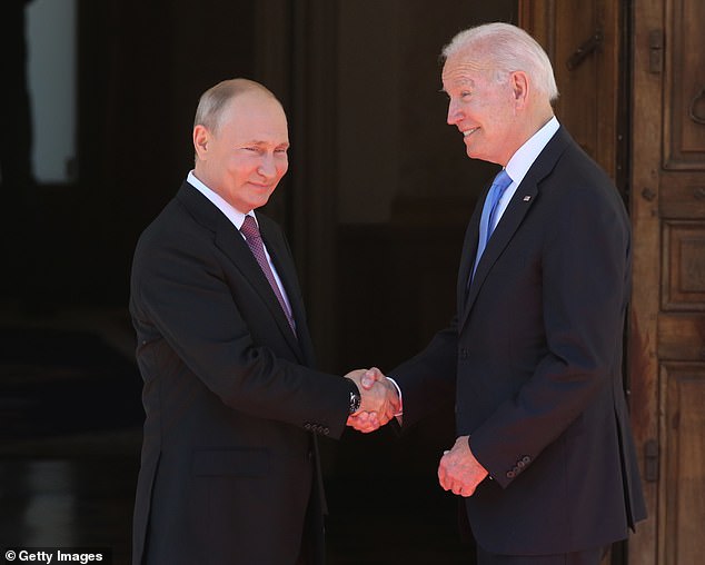 Russian President Vladimir Putin (left) greets US President Joe Biden (right) during the 2021 US-Russia Summit at La Grange Villa near Lake Geneva on June 16, 2021.