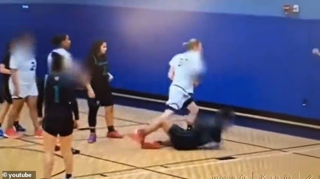 The video shows the transgender player ripping the ball from another player's arms, forcing her to fall.