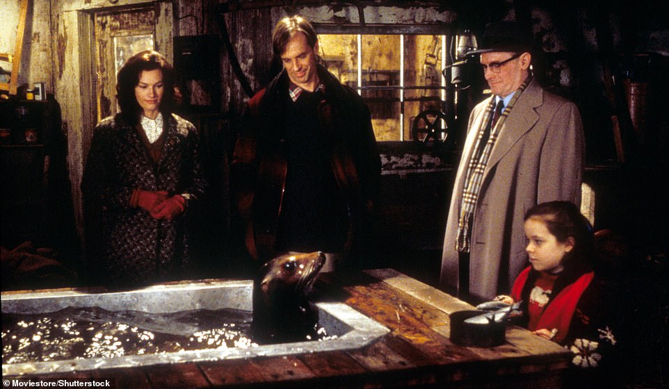 Field is seen far left in the film Andre with Keith Carradine and Tina Majorino in 1994.