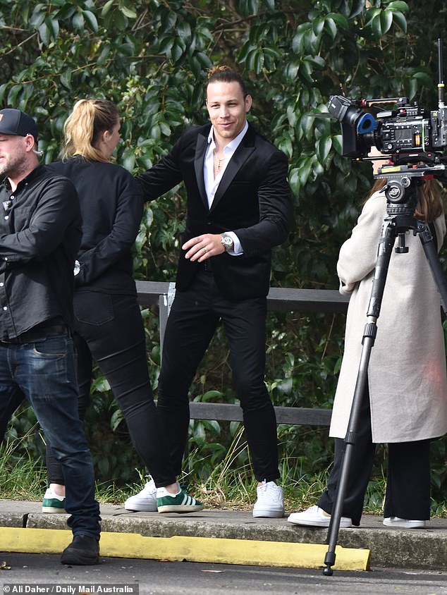 Photos taken by Daily Mail Australia show Jayden unconcerned by the claims, having fun with his producer while posing for paparazzi.