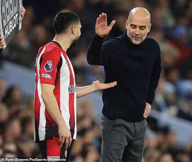 Neal Maupay received a friendly greeting from Pep Guardiola but the City fans were not so kind