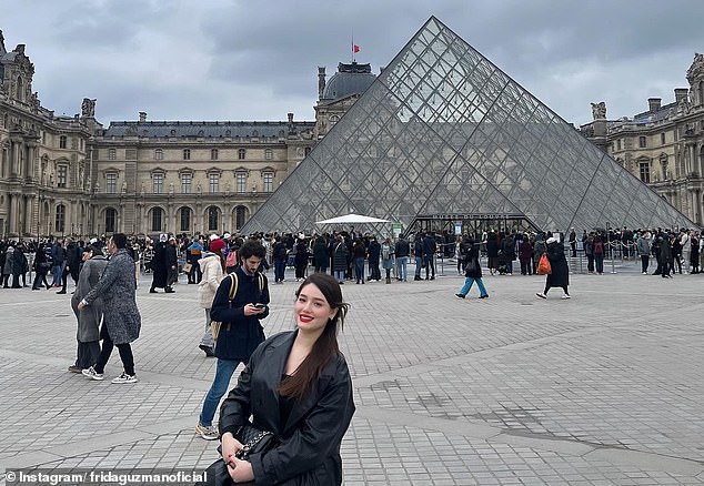 Next to the glass pyramid in front of the Louvre Museum in the French capital