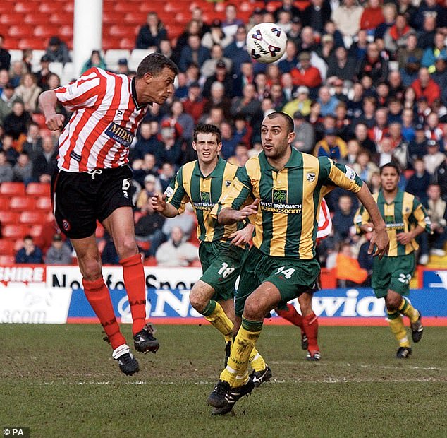 Sheffield United's Keith Curle heads the ball as the hosts try to find a decisive goal