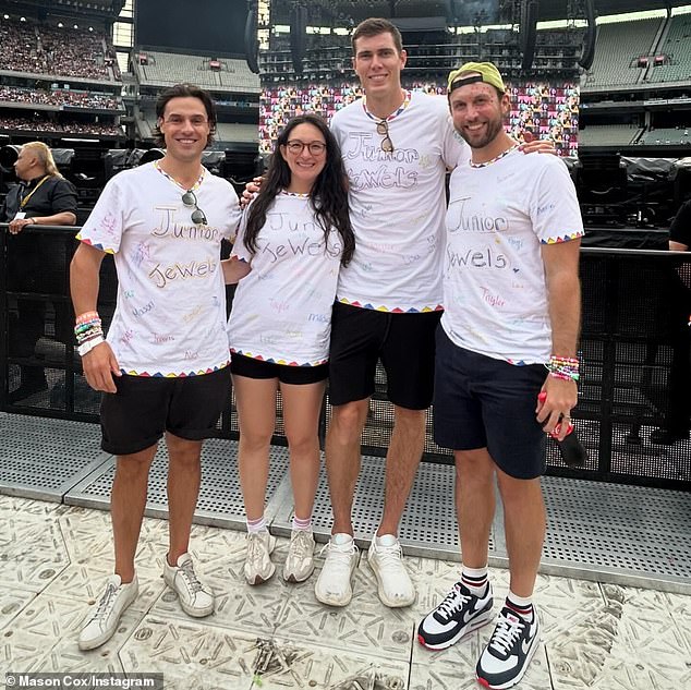 Collingwood's 211cm ruckman Mason Cox (pictured at one of Swift's MCG gigs, second from right) asked for help contacting fans after he ruined their view with his huge frame.