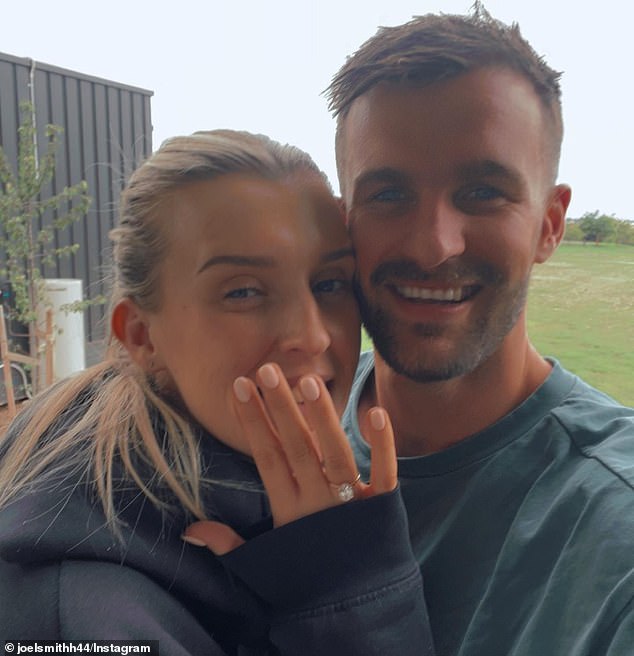 Smith (pictured with fiancee Elise Carroll) has been accused of sending cocaine text messages to other Melbourne players.