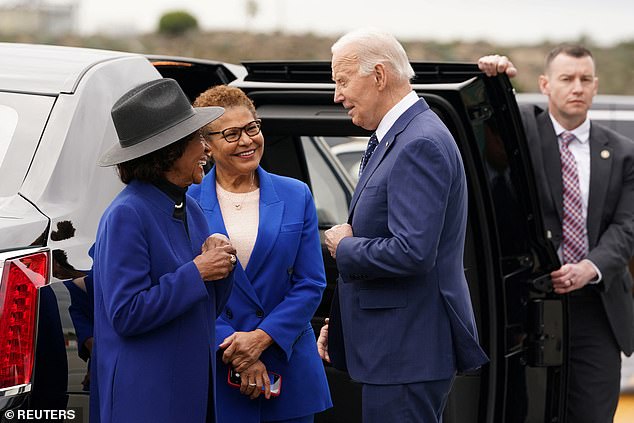 U.S. Rep. Maxine Waters (D-CA) and Los Angeles Mayor Karen Bass greet U.S. President Joe Biden upon his arrival in Los Angeles, California, on Tuesday afternoon.