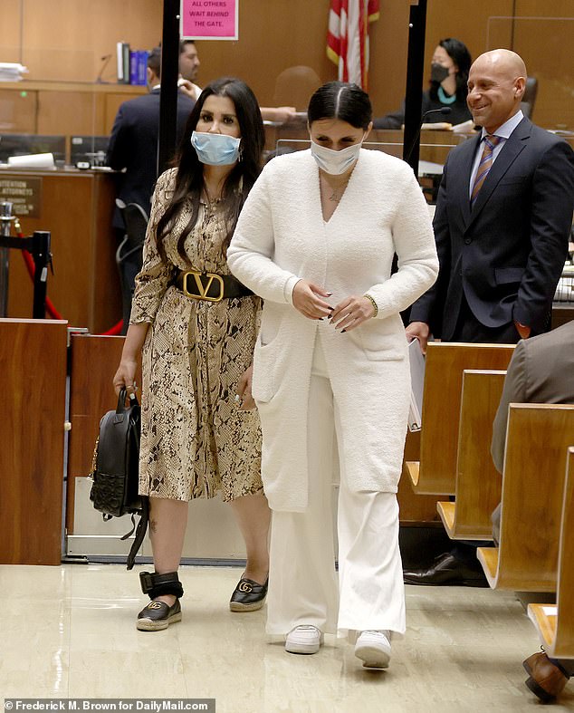 The mother and daughter (pictured together at a previous hearing in September 2022) face felony charges for practicing medicine without certification, in addition to murder charges.