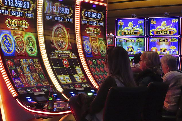 Players play slot machines at the Ocean Casino Resort in Atlantic City. The city earned $5.77 billion in gambling revenue in 2023.
