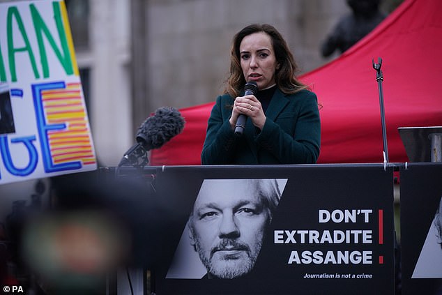 Stella Assange, the wife of Julian Assange, addresses supporters outside the Royal Courts of Justice in London.
