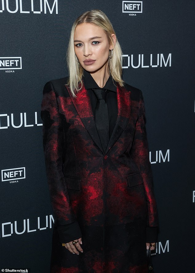 Roxy Horner showed off her unique sense of style by opting for a red and black spotted two-piece pantsuit.