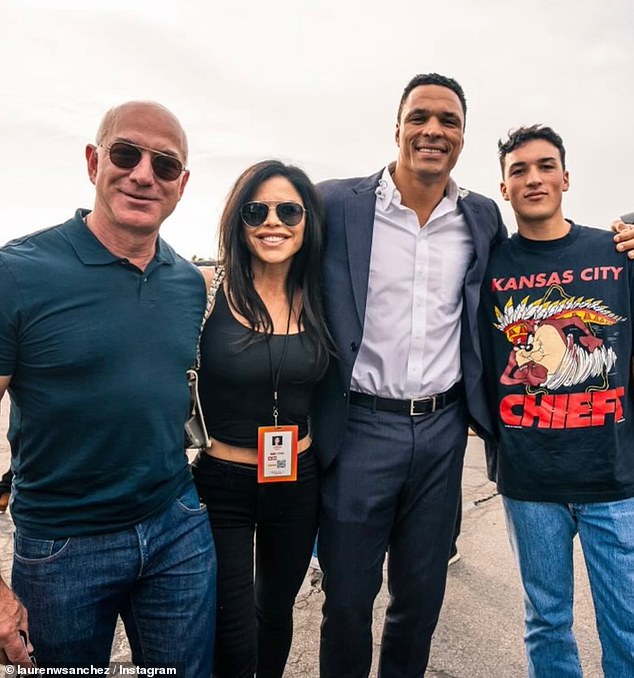 A more recent snapshot captures Nikko wearing a Kansas City Chiefs jersey while standing next to his father, mother and Bezos, his future stepfather (from left to right).
