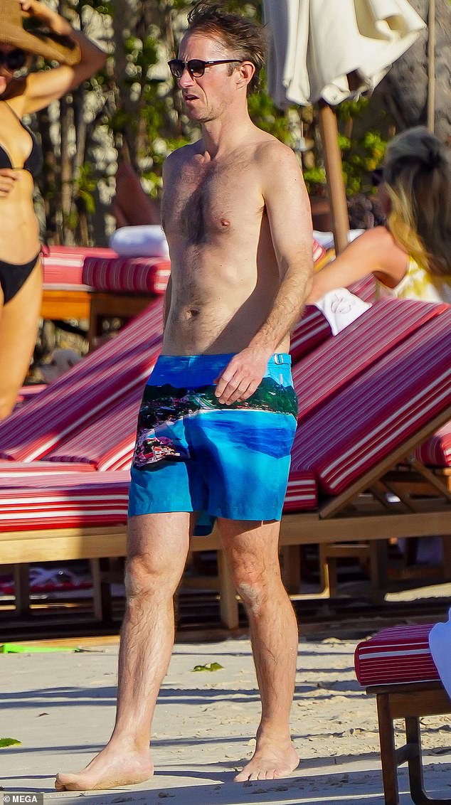 James Matthews is seen wearing a pair of tropical island themed boxers for his day at the beach.