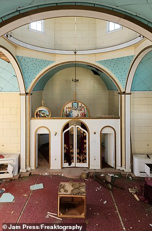 In the picture: the interior of the Ukrainian church in the abandoned town of Insinger.