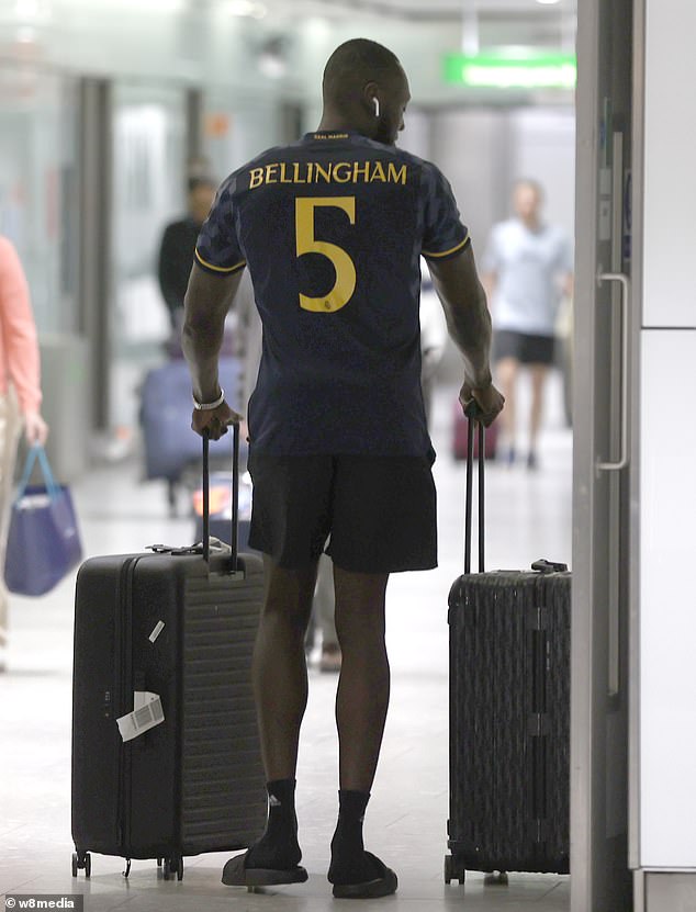 Meanwhile, Stormzy donned a purple T-shirt and some Real Madrid shorts as he pushed two suitcases to his car.