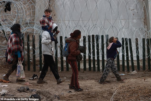 Migrants cross the border to be received by Customs and Border Protection to be processed and evaluate their asylum claims.