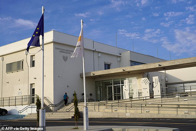 Flags fly in front of the Famagusta district court in Paralimni on October 5, 2023