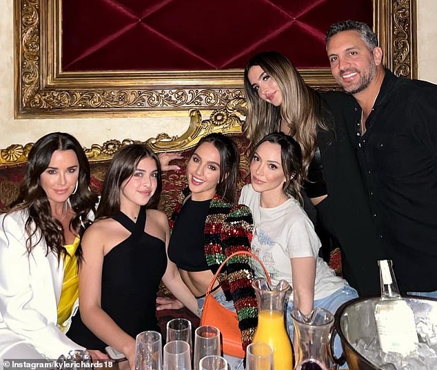 Kyle and Mauricio pictured with their three daughters Alexia, 27, Sophia, 24, and Portia, 16, as well as Kyle's eldest daughter Farrah, 35.