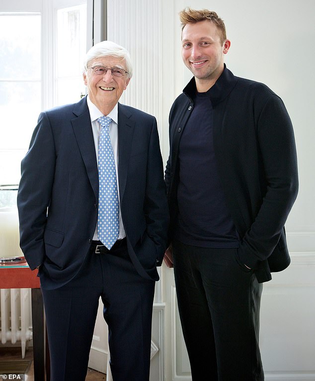 The five-time Olympic gold medalist came out as gay during an interview with respected English television presenter Sir Michael Parkinson (left) in July 2014.