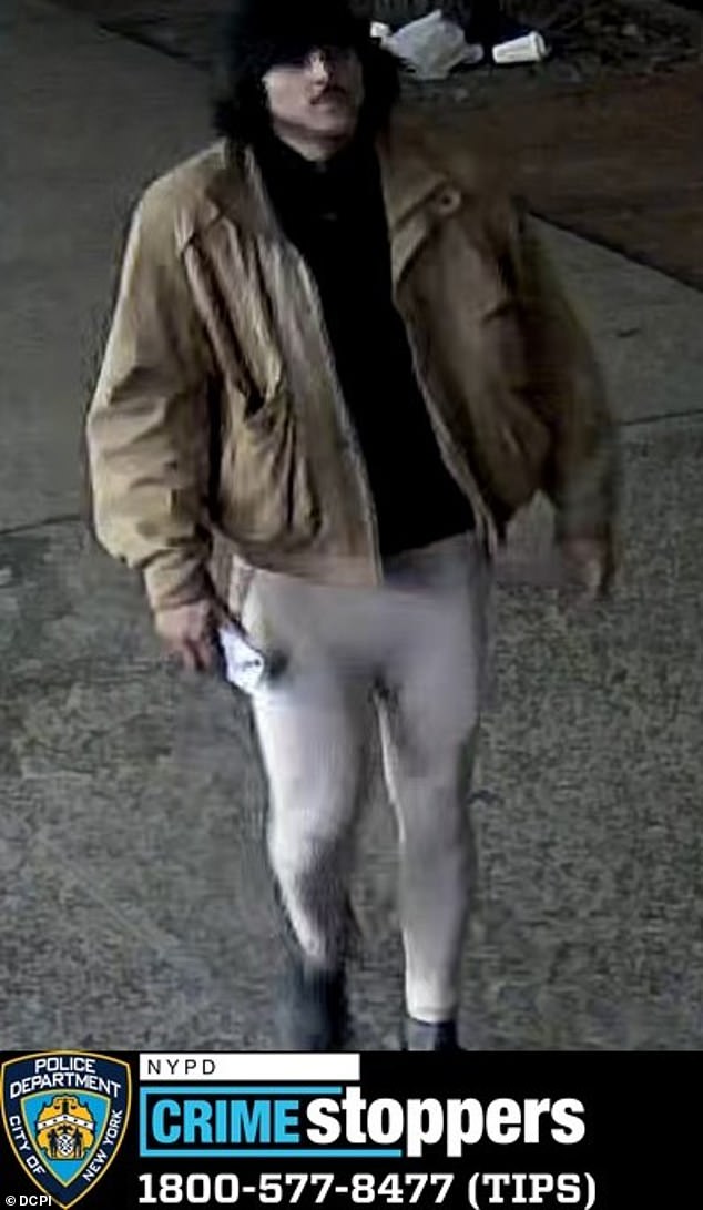 A surveillance image shows the suspect in Oleas-Arancibia's gruesome murder wearing a suit in Manhattan.