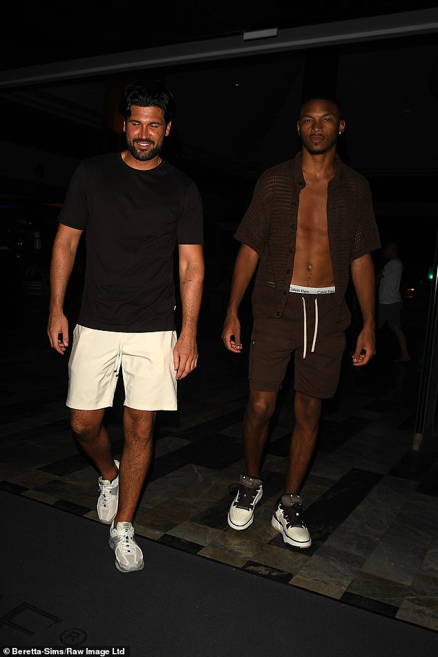 The duo reportedly kissed on a night out and have been spending time together ever since after getting close during the trip (pictured, Dan Edgar and Roman Hackett).