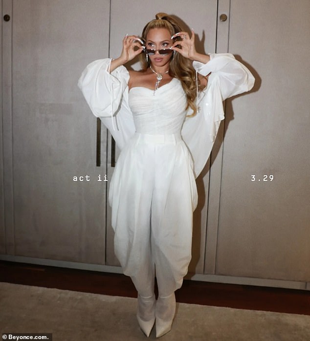 Beyonce also wore a matching sweater, which featured a pair of oversized sleeves, and donned high heels to the party.